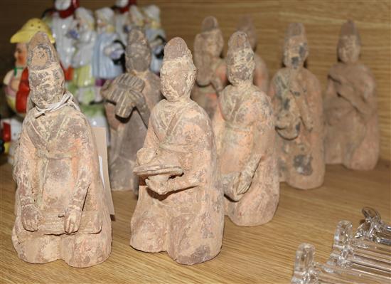 Nine Tang dynasty style pottery kneeling figures